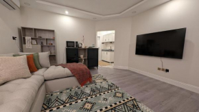 شقة في الرياض بتصميم فندقي عصري لراحتك104